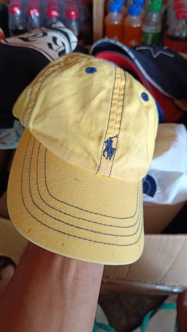 Polo by Ralph Lauren Yellow Cap (Category: Babies & Kids Fashion) located in Cagayan de Oro. Submitted by tryzumclothing292513 (Listing ID 1421625208, Image 1). Description: - Authentic Polo by Ralph Lauren cap - Color: Yellow - Features the iconic polo player logo - "POLO" embroidered on the back - Material: 100% cotton - Includes original tags - Made in Sri Lanka - INFANT SIZE.