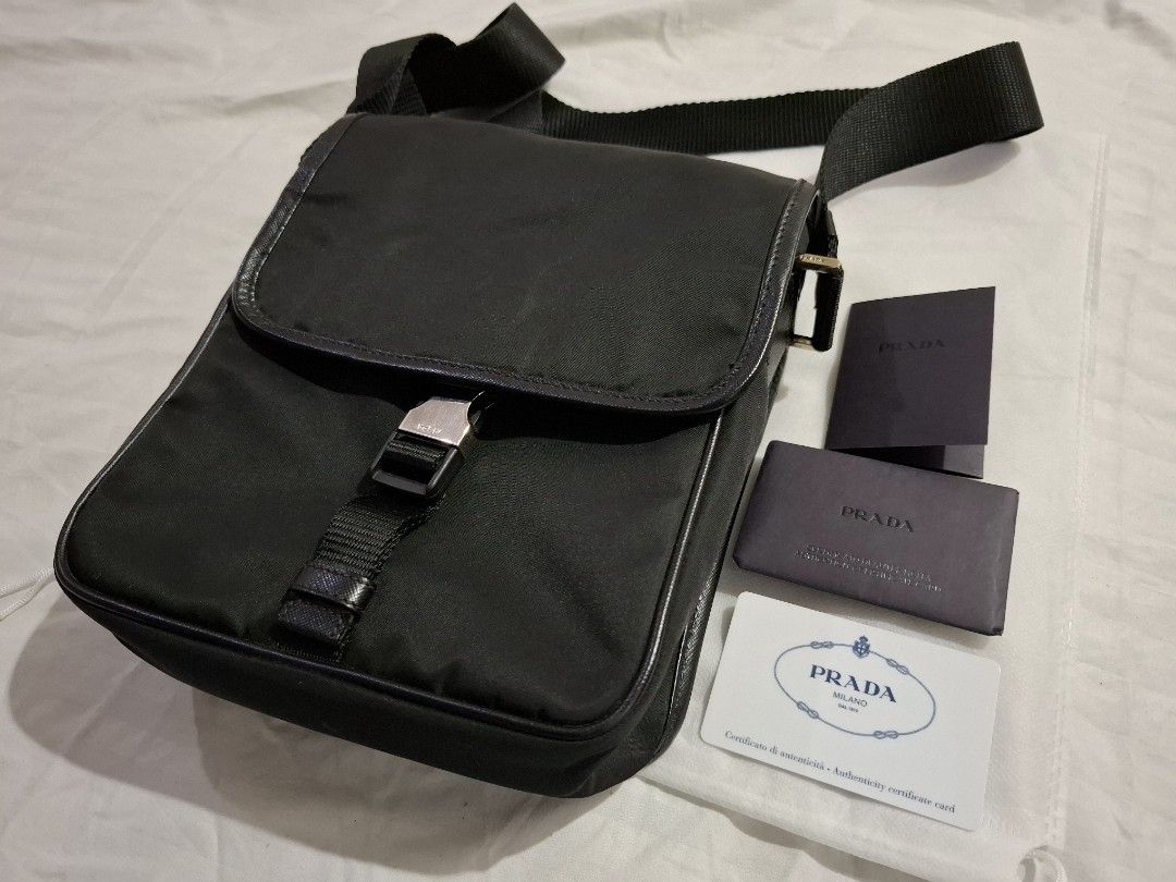 Prada Messenger Bag (with Authenticity Card) (Category: Luxury Bags & Wallets) located in Quezon City. Submitted by ejo23 (Listing ID 1421760940, Image 1). Description: Prada V167 Nylon and Saffiano Leather messenger bag. In very good condition. Comes with an official Prada authenticity certificate card. Feel free to message for more info and photos!.