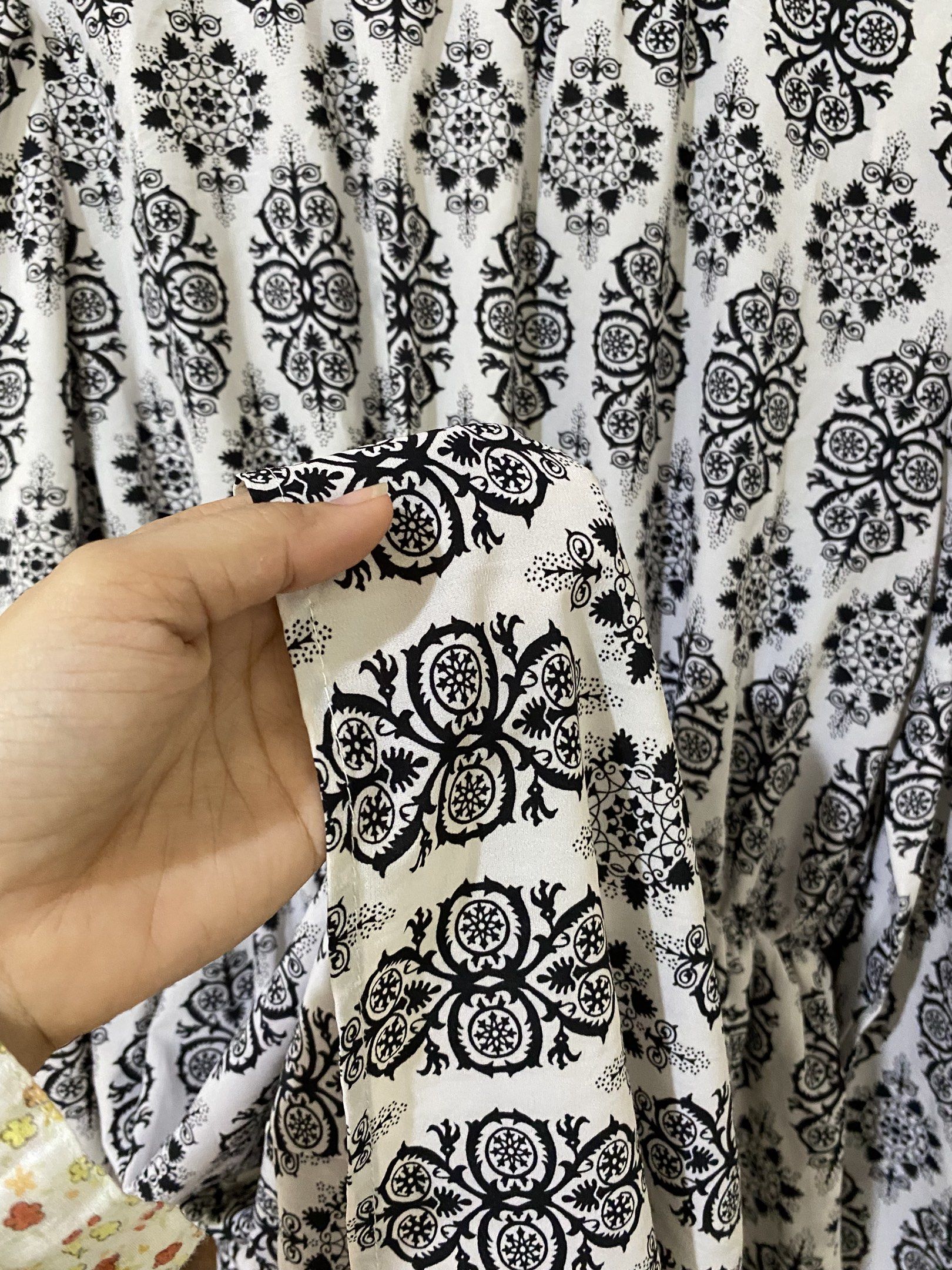 Printed Long Sleeve Dress (Category: Dresses) located in Guimba. Submitted by xeeeyaaaah (Listing ID 1421621697, Image 2). Description: - Black and white floral print - Long sleeves - Elastic waist - High neckline with ruffled detail - Lightweight fabric - Versatile for different occasions.