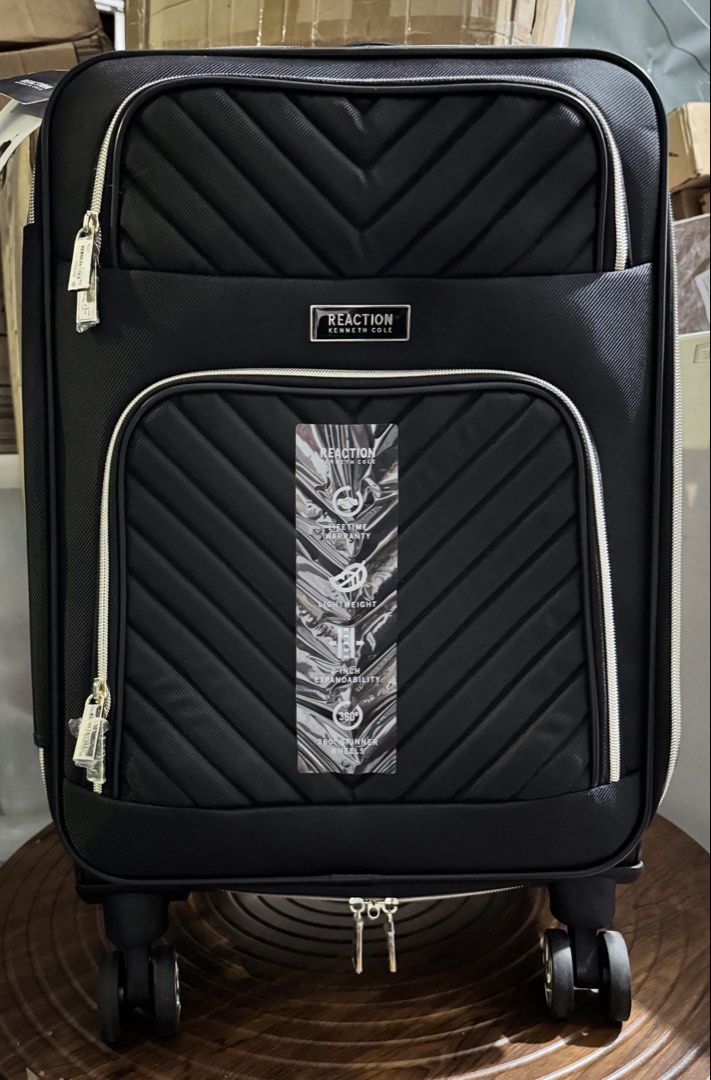 Reaction Kenneth Cole Black Luggage (Category: Luggage) located in Manila. Submitted by mr.barryow (Listing ID 1421765989, Image 1). Description: - Kenneth Cole black luggage with quilted design - Zippered front pocket - Top handle - 360-degree spinner wheels - Lifetime warranty - High expandability.
