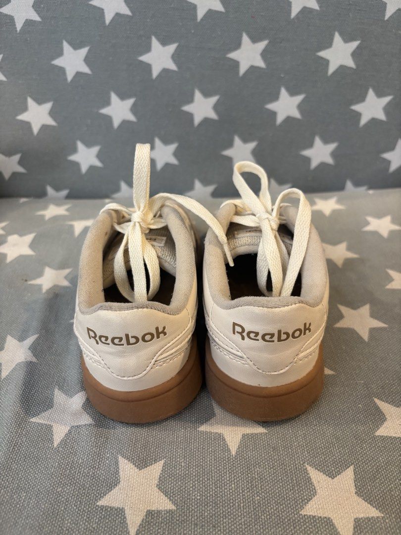 Reebok Sneakers (Category: Babies & Kids Fashion) located in Quezon City. Submitted by jcs_items (Listing ID 1421641288, Image 3). Description: - Cream-colored Reebok sneakers - Suede toe cap - Brown soles - Reebok logo on side and heel - Cream-colored laces Size: US 12k.