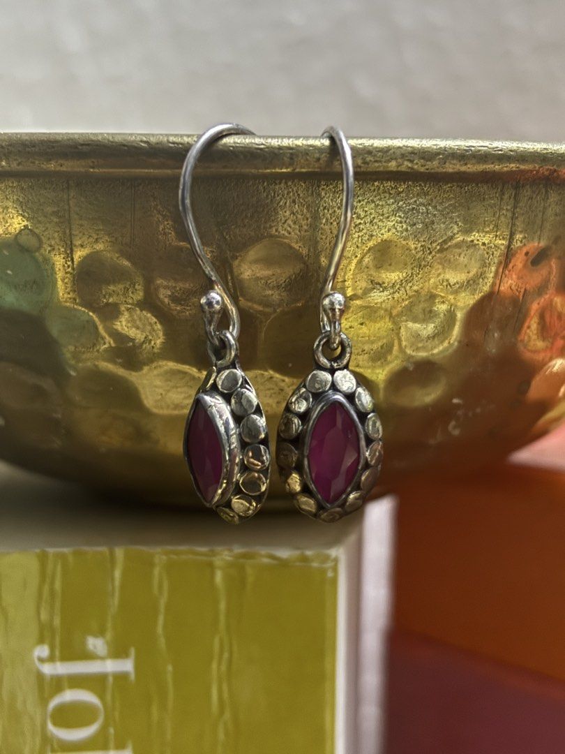 Ruby Drop Earrings (Category: Earrings) located in Singapore. Submitted by preesloved (Listing ID 1421764519, Image 1). Description: - Silver drop earrings - Ruby-colored stone - Unique textured border - Adds elegance to any outfit.