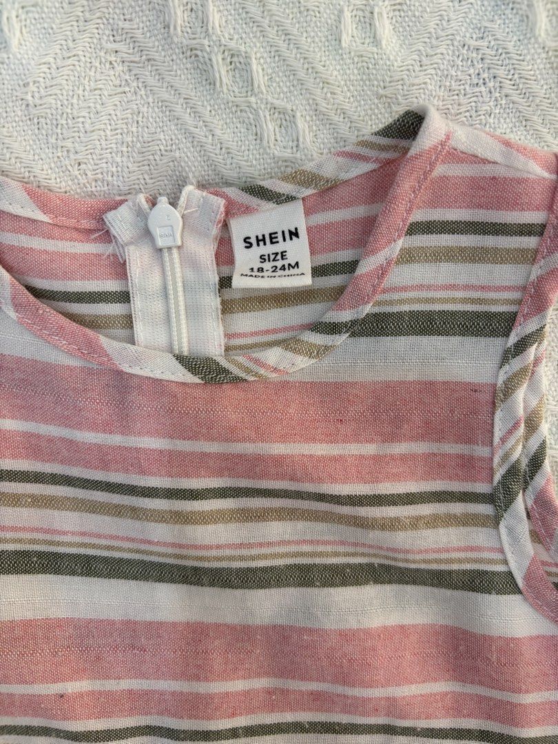 Shein Striped Dress 18-24M (Category: Babies & Kids Fashion) located in Cavite. Submitted by decluttererminer (Listing ID 1421740228, Image 2). Description: - Shein sleeveless dress - Striped pattern: pink, white, and olive green - Features a round neckline - Back zipper closure - Size: 18-24 months - Lightweight fabric - perfect for warm weather - First owner (my baby girl) - Last price posted - Washed - Mode of payment: GCash/BPI - Mode of deli