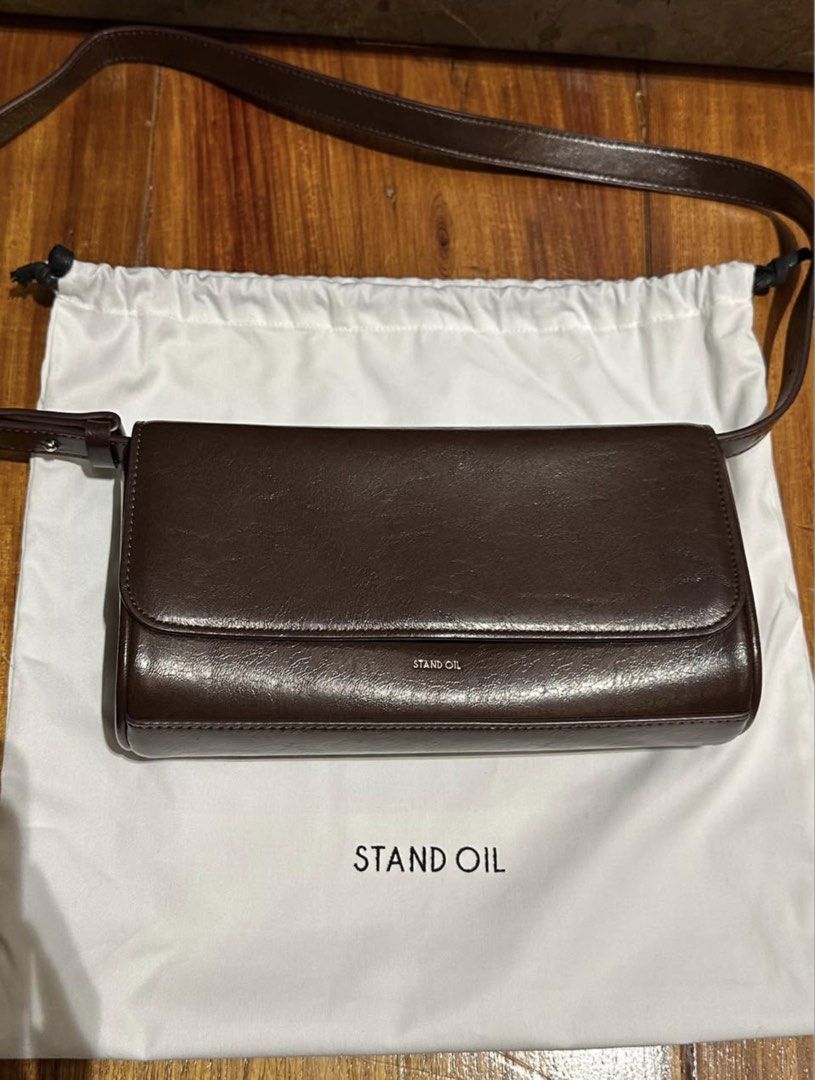 Stand Oil (Category: Shoulder Bags) located in Manila. Submitted by mdeclutterrr (Listing ID 1421653036, Image 2). Description: Stand Oil Bag (korean brand) Model: Butter Bag Classic Color: Maroon (“marron” on website) Bought in Korea Price is negotiable Used 1x (10/10 condition) Can be used as clutch, shoulder bag, crossbody bag Inclusions: Detachable long crossbody strap Dust bag .