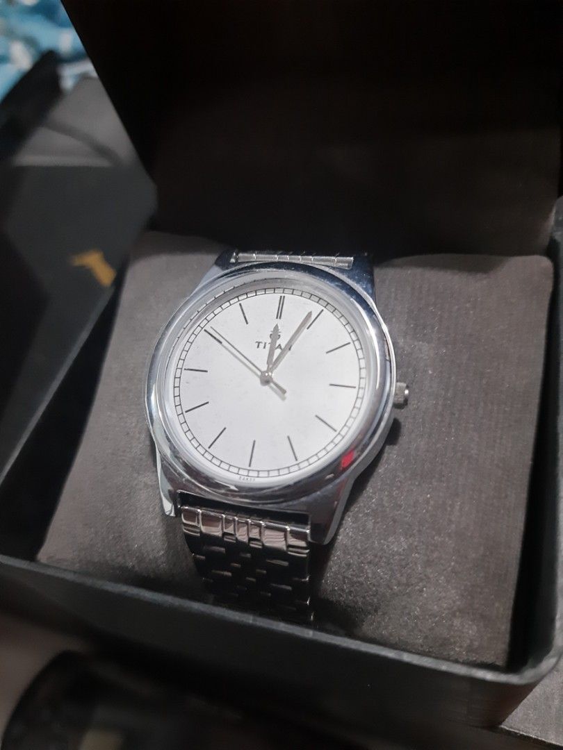 Titan dress formal watch (Category: Men's Watches) located in Paranaque City. Submitted by b_spilner (Listing ID 1421781260, Image 2). Description: Titan watch with case and box bnew original sleek design buyer pays for shipping negotiable.