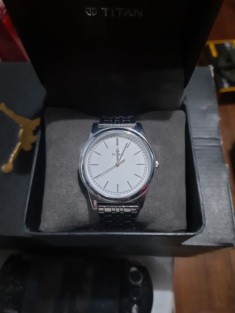 Titan dress formal watch (Category: Men's Watches) located in Paranaque City. Submitted by b_spilner (Listing ID 1421781260, Image 3). Description: Titan watch with case and box bnew original sleek design buyer pays for shipping negotiable.