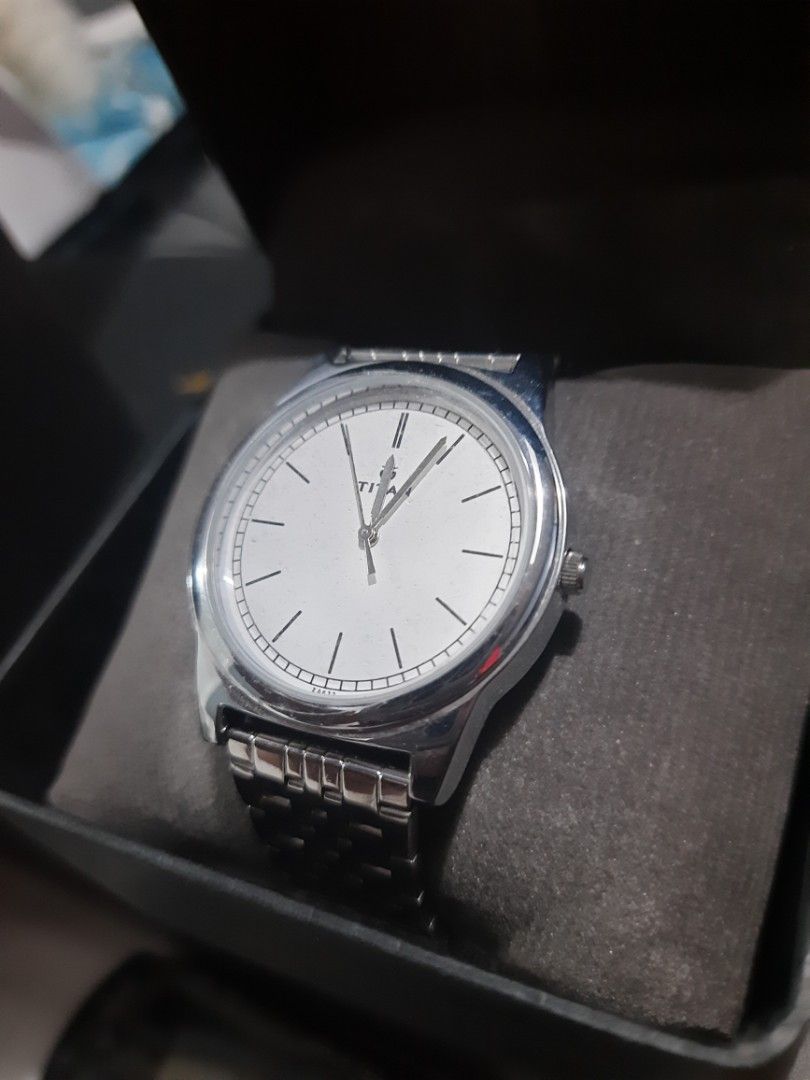 Titan dress formal watch (Category: Men's Watches) located in Paranaque City. Submitted by b_spilner (Listing ID 1421781260, Image 1). Description: Titan watch with case and box bnew original sleek design buyer pays for shipping negotiable.