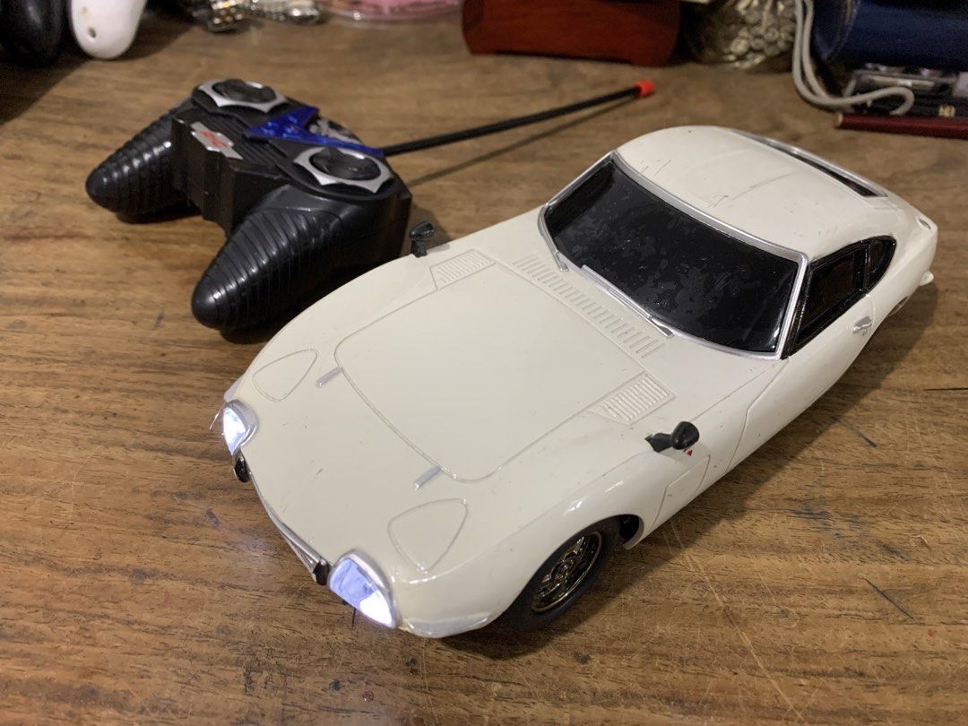 Toyota 2000GT RC Car (Category: Remote Control Toys) located in Manila. Submitted by miah_collectiblesurplus (Listing ID 1421673319, Image 3). Description: 690 pesos Location: Valenzuela - White Toyota 2000GT RC car - Includes remote control - Working headlights and taillights - Remote control operates at 40 MHz.