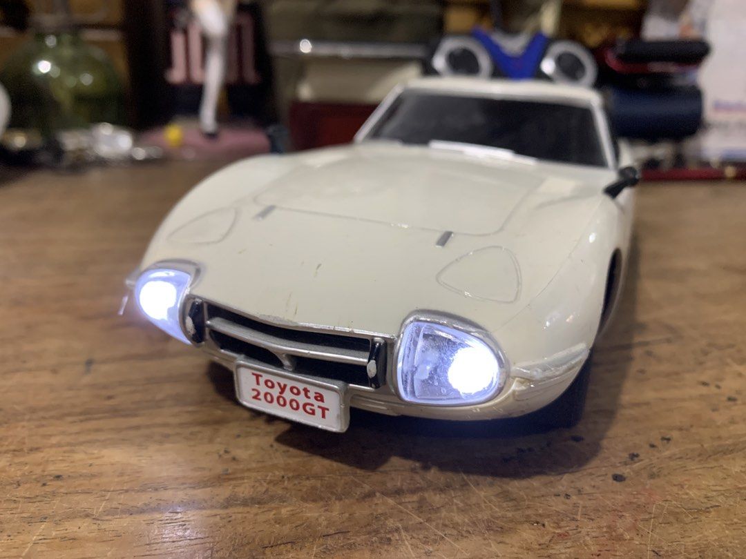 Toyota 2000GT RC Car (Category: Remote Control Toys) located in Manila. Submitted by miah_collectiblesurplus (Listing ID 1421673319, Image 2). Description: 690 pesos Location: Valenzuela - White Toyota 2000GT RC car - Includes remote control - Working headlights and taillights - Remote control operates at 40 MHz.