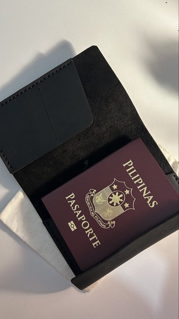 Trifold Genuine Leather Passport Size Journal (Category: Luxury Bags & Wallets) located in Calamba. Submitted by horibuys (Listing ID 1421745038, Image 3). Description: - Black leather passport size cover - Genuine cowhide OPU leather - Fits passport and fieldnotes size - Elastic closure - Multiple interior pockets for cards and ephemera - Includes a canvas storage pouch Handmade with love!.