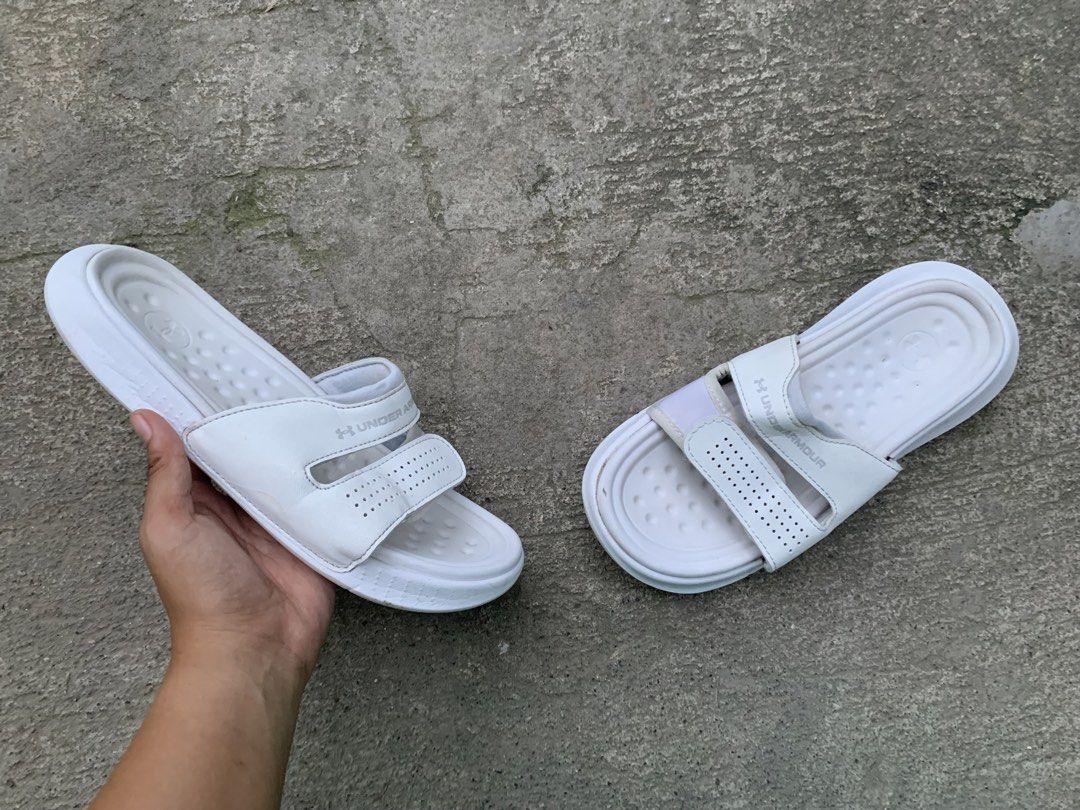 Under Armour Women's Slides (Category: Slippers and slides) located in Sibulan. Submitted by sharlyngra11287 (Listing ID 1421708423, Image 1). Description: Mine: 610 pesos🍀 Brand: Under Armour Size: 38 Condition: Normal sign of usage and may kaunti heeldrag/toedrag💗🎀.