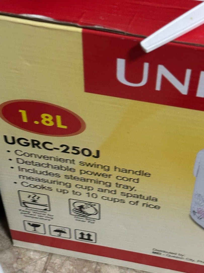Union 1.8L Rice Cooker Swing Handle (Category: Cookers) located in Baliuag. Submitted by stopandshoppe (Listing ID 1419078848, Image 2). Description: - Union 1.8L Jar Type Rice Cooker - Model: UGRC-250J - Elegant white finish with floral design - Convenient swing handle - Easy-to-use control panel with indicator lights.