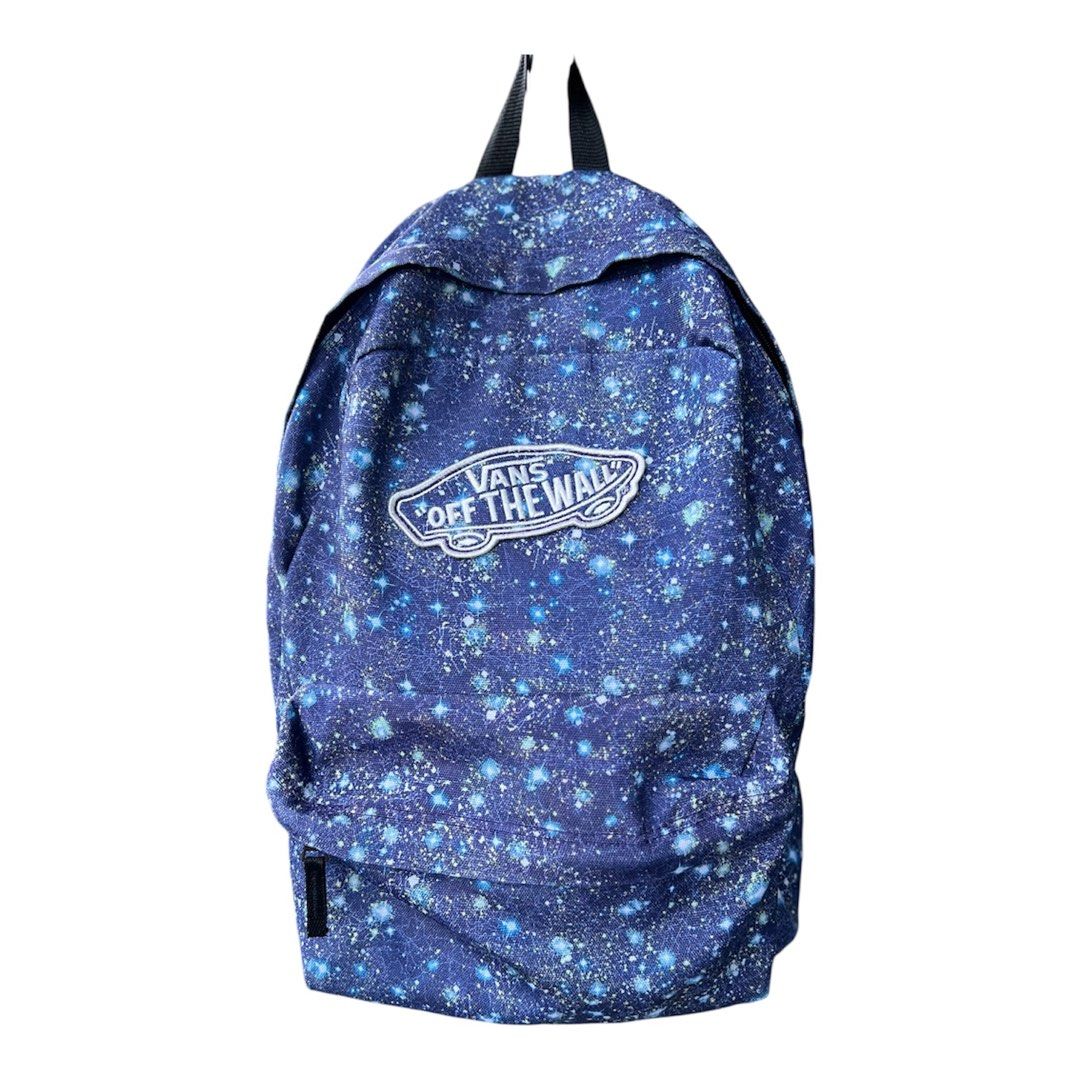 Vans Off The Wall Galaxy Backpack (Category: Backpacks) located in Cavite. Submitted by slumbermanila (Listing ID 1421727581, Image 1). Description: -signs of use - Vans galaxy print backpack - Main compartment - Adjustable shoulder straps - Vans logo zippers - Black back panel and straps - Interior shows some wear - YKK zipper.
