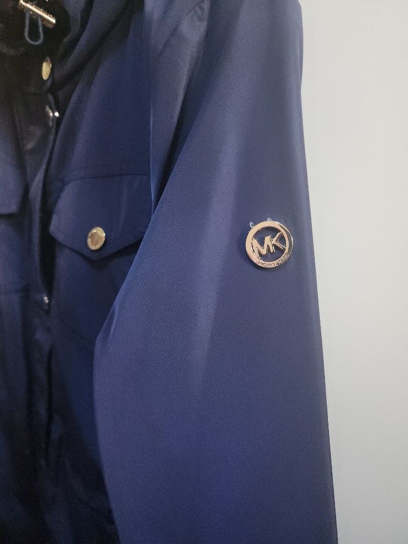 Water Repellant Hooded Parka (Category: Coats, Jackets and Outerwear) located in Makati City. Submitted by jengrace (Listing ID 1421674370, Image 3). Description: Original. Bought in the U.S. Navy blue colour. Water repellant. Long sleeves parka jacket. Fully lined. Wash tag attached. Hidden hood. High collar. Metal zip and button fastening. Front pockets with flap and zipper closure. Adjustable waist and hem with drawstrings. Width: 46 cm Length