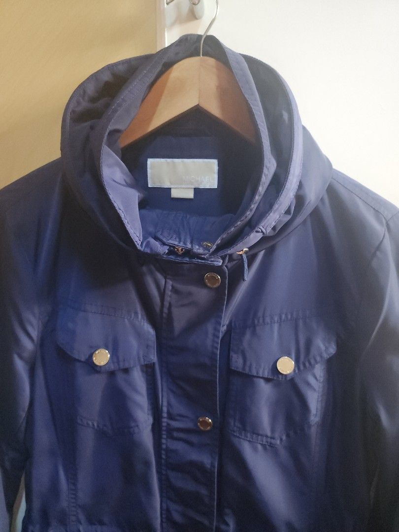 Water Repellant Hooded Parka (Category: Coats, Jackets and Outerwear) located in Makati City. Submitted by jengrace (Listing ID 1421674370, Image 2). Description: Original. Bought in the U.S. Navy blue colour. Water repellant. Long sleeves parka jacket. Fully lined. Wash tag attached. Hidden hood. High collar. Metal zip and button fastening. Front pockets with flap and zipper closure. Adjustable waist and hem with drawstrings. Width: 46 cm Length