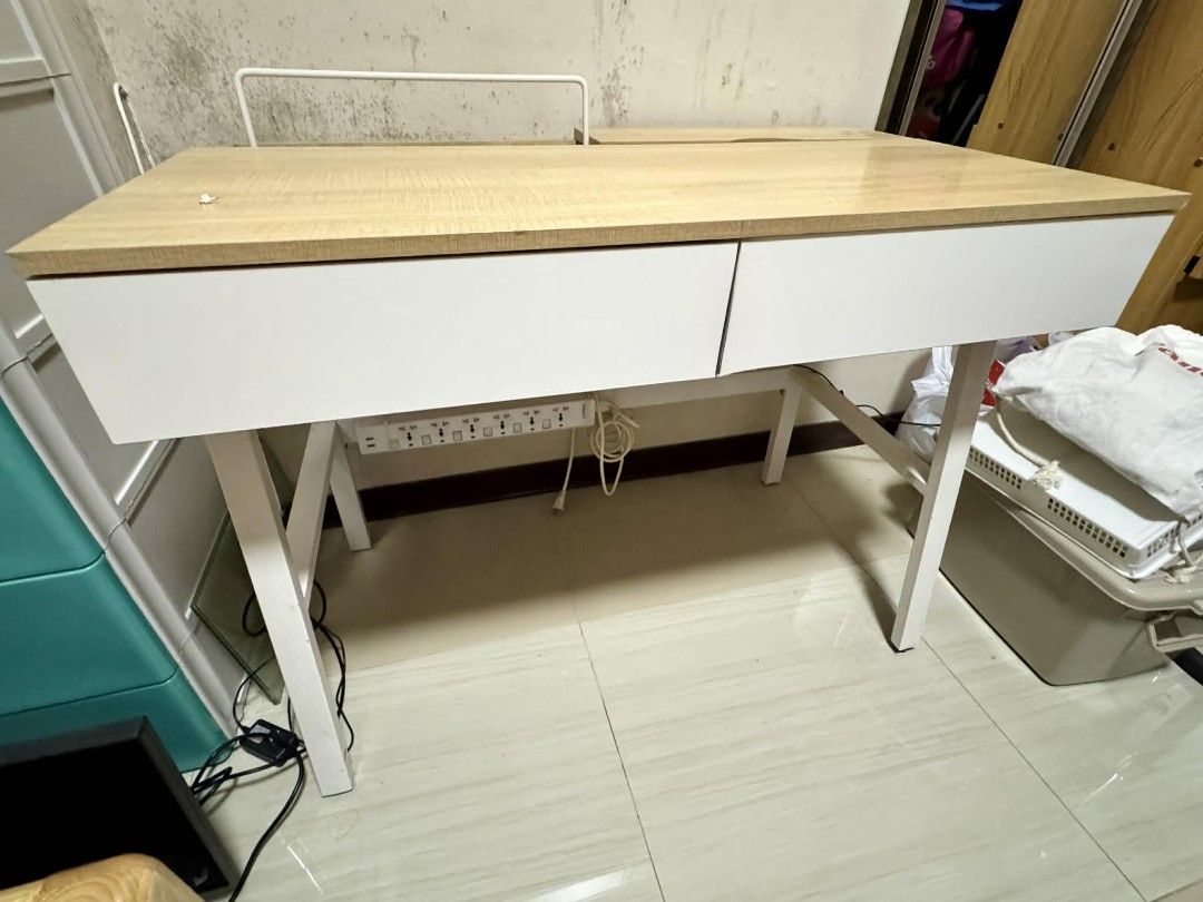 White and Wood Computer Desk (Category: Tables & Sets) located in Pasig City. Submitted by reportpad908761 (Listing ID 1395188558, Image 3). Description: Desktop Table P3500 (Negotiable) - White frame computer desk - Light wood-colored tabletop - Two storage drawers - Minimalist design - Ideal for home office or study - Ample space for work and gaming essentials Additional notes: *used but still in good condition *minimal dents, does not affect t