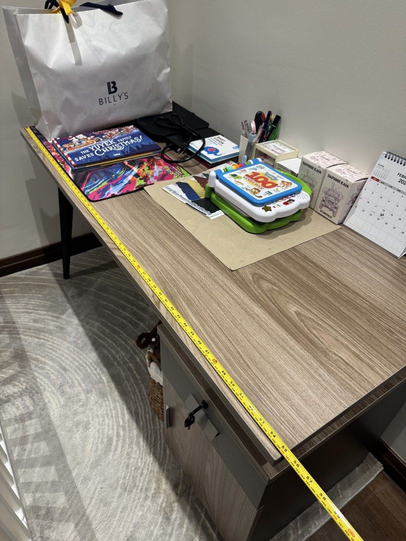 Wooden Office Desk with Cabinet (Category: Office Furniture & Fixtures) located in Manila. Submitted by ctluxefinds (Listing ID 1421724539, Image 3). Description: Light Used with minor issue, shown in the last photo Color : Walnut & Grey Size : L140 x W60 x H75cm 2 Side Drawers Pedestal, Key & Lock High Quality Drawer Railings .