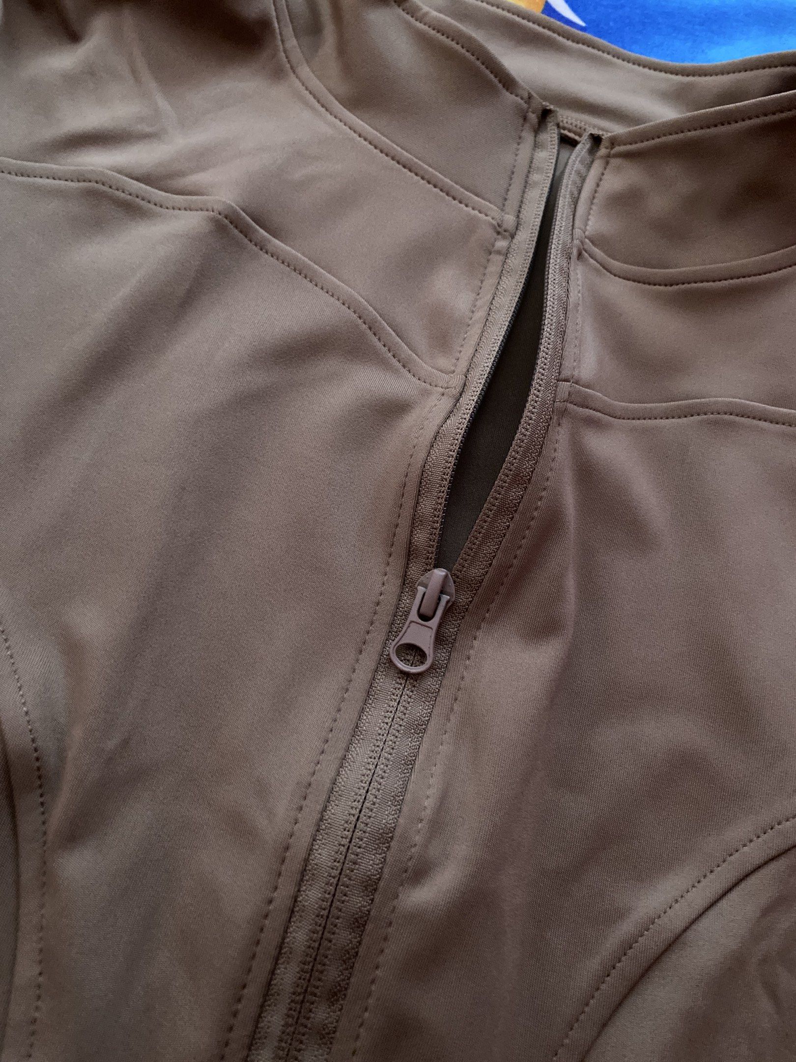 Yoga Clothing Jacket - Size L (Category: Coats, Jackets and Outerwear) located in Valenzuela. Submitted by reidiokno (Listing ID 1421677322, Image 1). Description: - Size L yoga jacket - Full zipper closure - High collar - Thumb holes on sleeves - Neutral tan color Never been used. Masikip sa dibdib part 🤣.