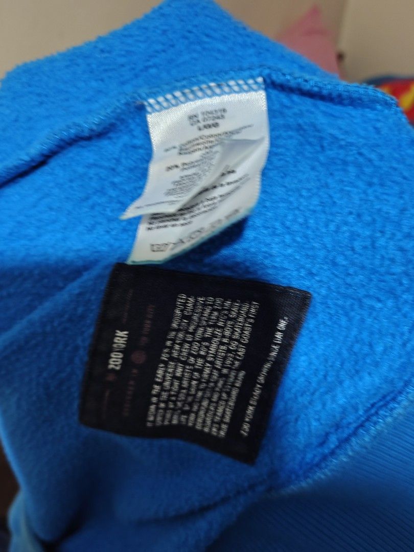 Zoo York Blue Hoodie (Category: Hoodies) located in Don Carlos. Submitted by ej_yap-cambil.19 (Listing ID 1421730108, Image 3). Description: - Zoo York hoodie - Size: L -Length: 28inches -Width: 30inches - Color: Blue - Features a full zip closure - Design: Printed on the front - Material: Soft, fleece-like fabric - Made in China - Brand: Zoo York.
