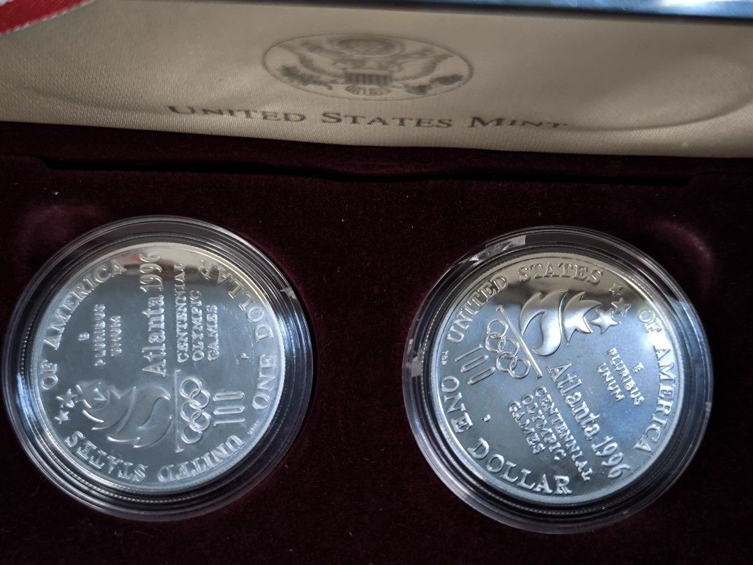 1996 US Olympic Two-Coin Silver Proof Set (Category: Currency) located in Paranaque City. Submitted by phcoincollective (Listing ID 1421920456, Image 2). Description: — 1996 US Olympic Two-Coin Silver Proof Set — Includes two silver proof coins — Complete box set with a Certificate of Authenticity from the United States Mint — Housed in a maroon presentation box — Features designs of a rowing team and a high jumper.