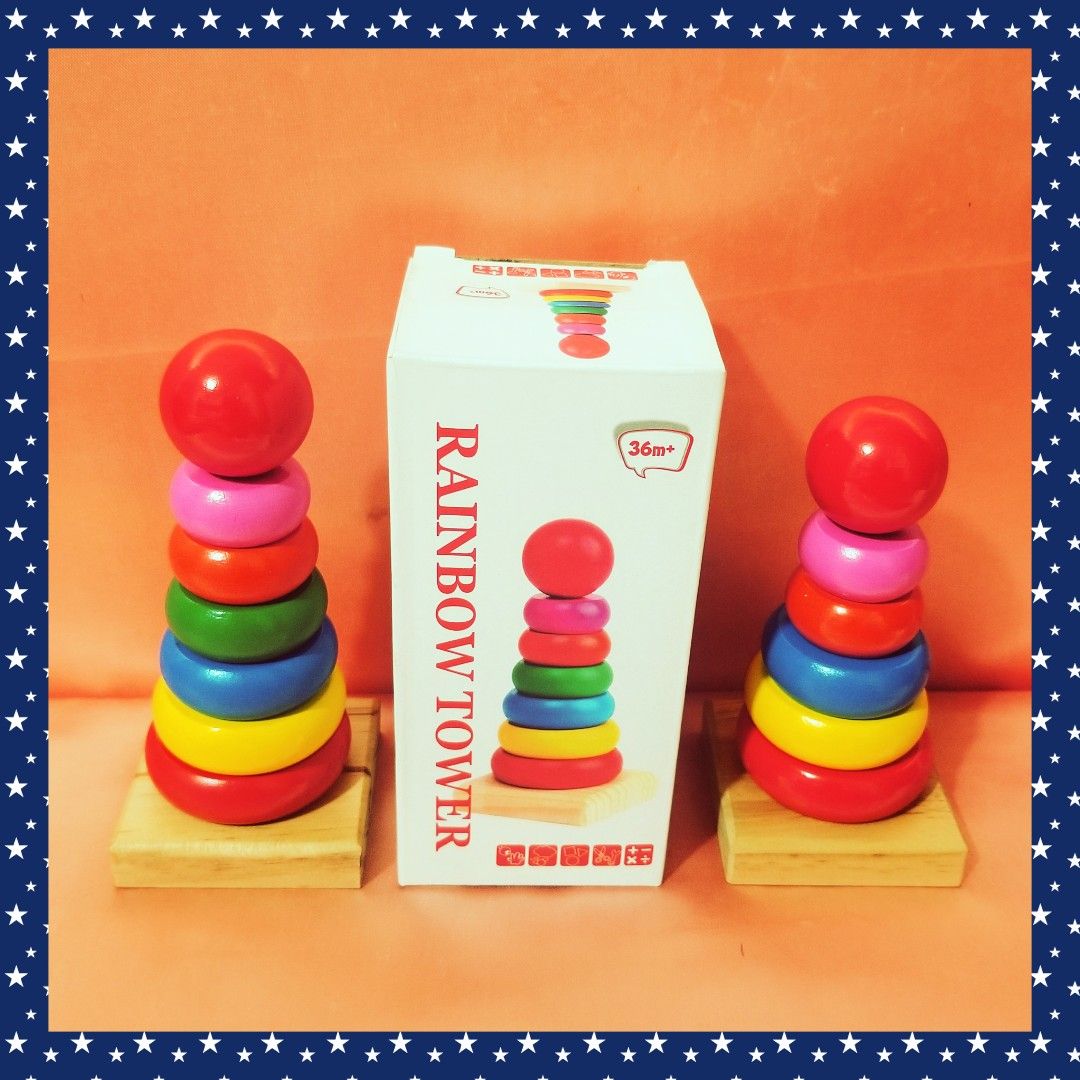 2 Sets of Rainbow Tower Stacking Toy (Category: Infant Playtime) located in Caloocan City. Submitted by happyfeelbygif777 (Listing ID 1421867988, Image 2). Description: ❤Two sets, 6 and 7 layers of round wooden Rainbow Tower stacking toy designed for children aged 36 months and up ❤Comes with a box. ❤Features a wooden base and vibrant glossy rings in various colors. Includes a red ball on top. ❤Helps develop hand-eye coordination, fine motor skil
