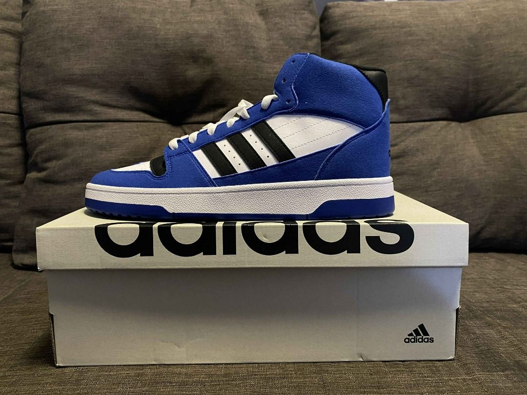 Adidas Break Start Mid Shoes (Category: Sneakers) located in Rizal. Submitted by TheRetailAddict (Listing ID 1421868590, Image 1). Description: Adidas Hoops Mid 2.0 sneakers in blue and white. Features the iconic Adidas stripes in black. The shoes are high-top style with a white sole. Comes with the original box. The shoes appear to be unworn..