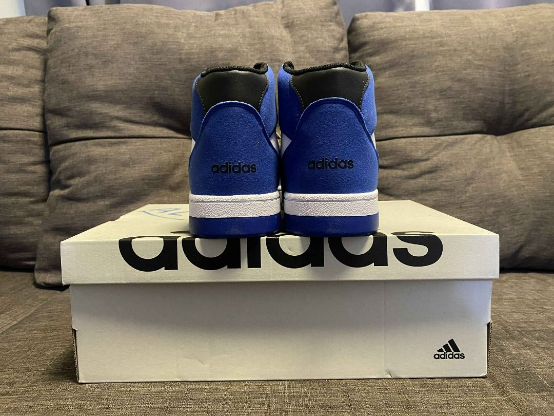 Adidas Break Start Mid Shoes (Category: Sneakers) located in Rizal. Submitted by TheRetailAddict (Listing ID 1421868590, Image 2). Description: Adidas Hoops Mid 2.0 sneakers in blue and white. Features the iconic Adidas stripes in black. The shoes are high-top style with a white sole. Comes with the original box. The shoes appear to be unworn..