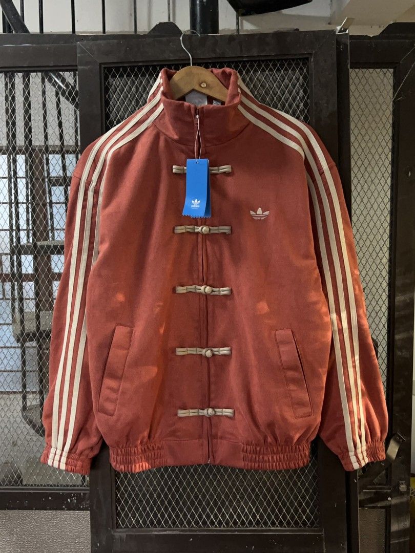 ADIDAS CHINESE NEW YEAR JACKET (Category: Coats, Jackets and Outerwear) located in Taguig. Submitted by patrickbas46594 (Listing ID 1421873676, Image 1). Description: BRANDNEW WITH HANGTAG ‼️ • ONHAND SIZES: S | M | L • XS, XL, 2XL AVAILABLE FOR PRE ORDER • COLOR MAY VARY DUE TO LIGHTING DM ME FOR MORE DETAILS 📩 TAGUIG LOWER BICUTAN 📍.