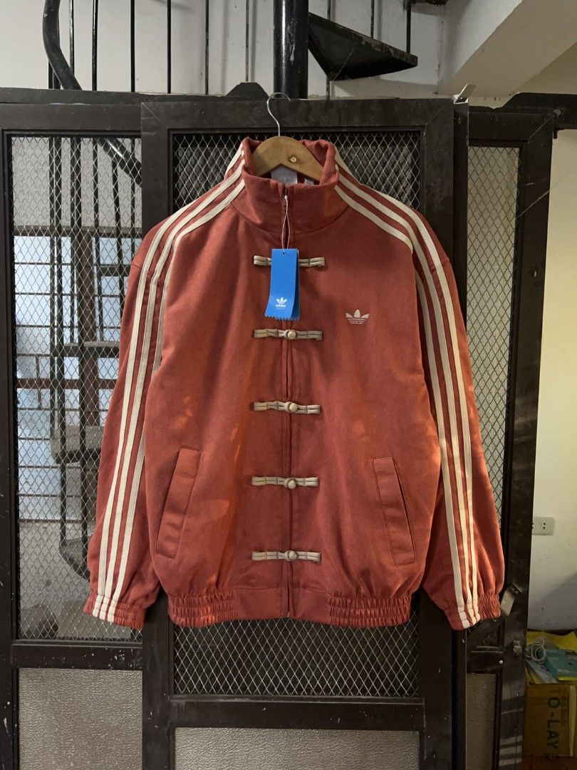 ADIDAS CHINESE NEW YEAR JACKET (Category: Coats, Jackets and Outerwear) located in Taguig. Submitted by patrickbas46594 (Listing ID 1421873676, Image 2). Description: BRANDNEW WITH HANGTAG ‼️ • ONHAND SIZES: S | M | L • XS, XL, 2XL AVAILABLE FOR PRE ORDER • COLOR MAY VARY DUE TO LIGHTING DM ME FOR MORE DETAILS 📩 TAGUIG LOWER BICUTAN 📍.