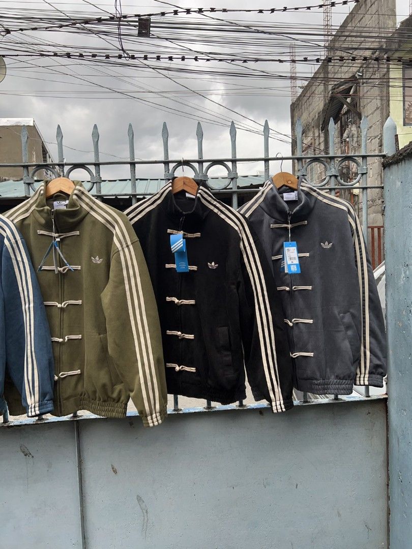 ADIDAS CHINESE NEW YEAR JACKET (Category: Coats, Jackets and Outerwear) located in Taguig. Submitted by patrickbas46594 (Listing ID 1421876932, Image 3). Description: 𝐁𝐑𝐀𝐍𝐃𝐍𝐄𝐖 𝐖𝐈𝐓𝐇 𝐇𝐀𝐍𝐆𝐓𝐀𝐆 ‼️ Limited sizes available onhand 📌 PRE ORDER AVAILABLE FOR UNAVAILABLE SIZES/COLOR | XS - 2XL | ✔️ Sizes onhand: S | M | L | XL | •Sizes & price depends on the color of the jacket TAGUIG LOWER BICUTAN 📍 DM ME FOR MORE DETAILS 📩.