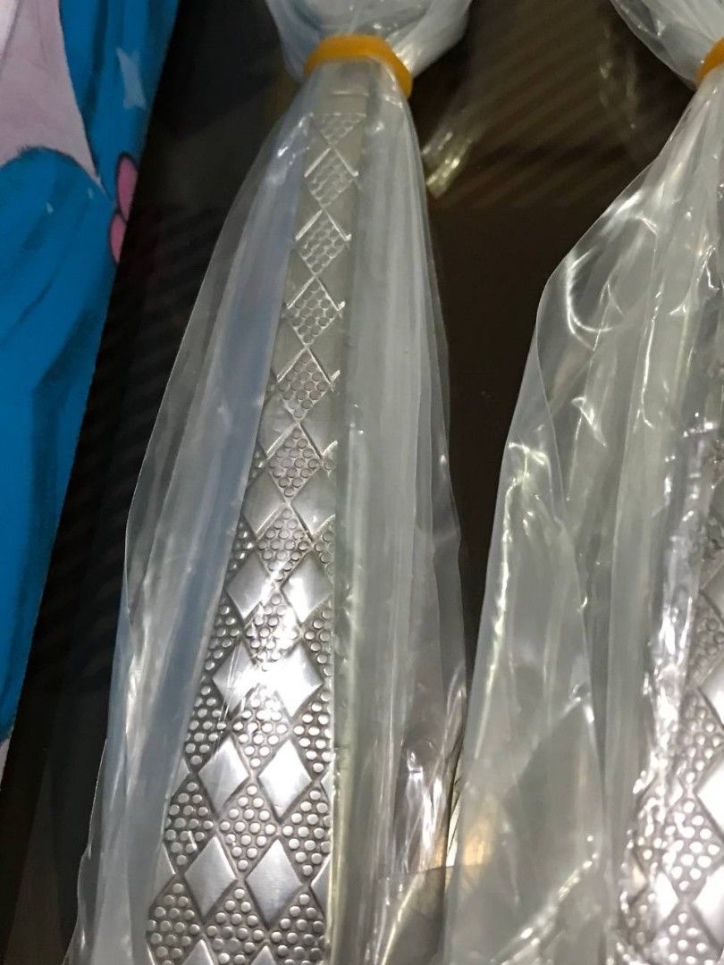 Avon x Love Marie 8-pc Spoon and Fork Set (Category: Dinnerware & Cutlery) located in Cabatuan. Submitted by sabel.2929 (Listing ID 1421880597, Image 2). Description: - Avon x Love Marie 8-piece cutlery set - Includes 4 spoons and 4 forks - Made of durable stainless steel - Features elegant diamond pattern handles - Comes in original packaging - Care instructions included.
