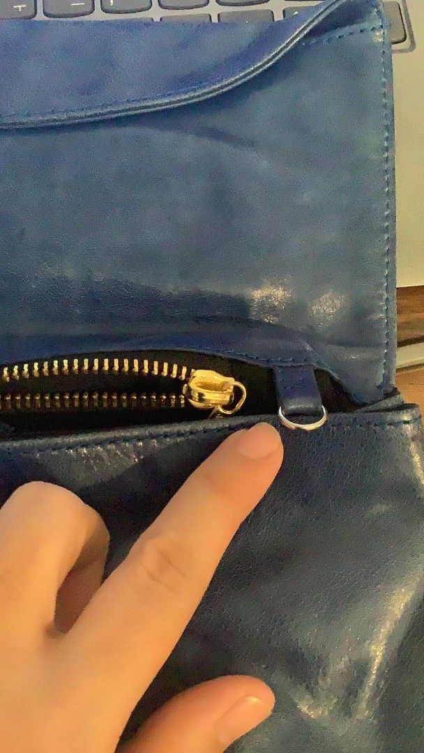Balenciaga Leather Wallet (Category: Luxury Bags & Wallets) located in Manila. Submitted by aabila (Listing ID 1421903289, Image 2). Description: - Balenciaga envelope clutch - Blue leather - Zip closure - Multiple compartments - Front zipper pocket - Snap closure - Brand logo - 'Made in Italy' label.