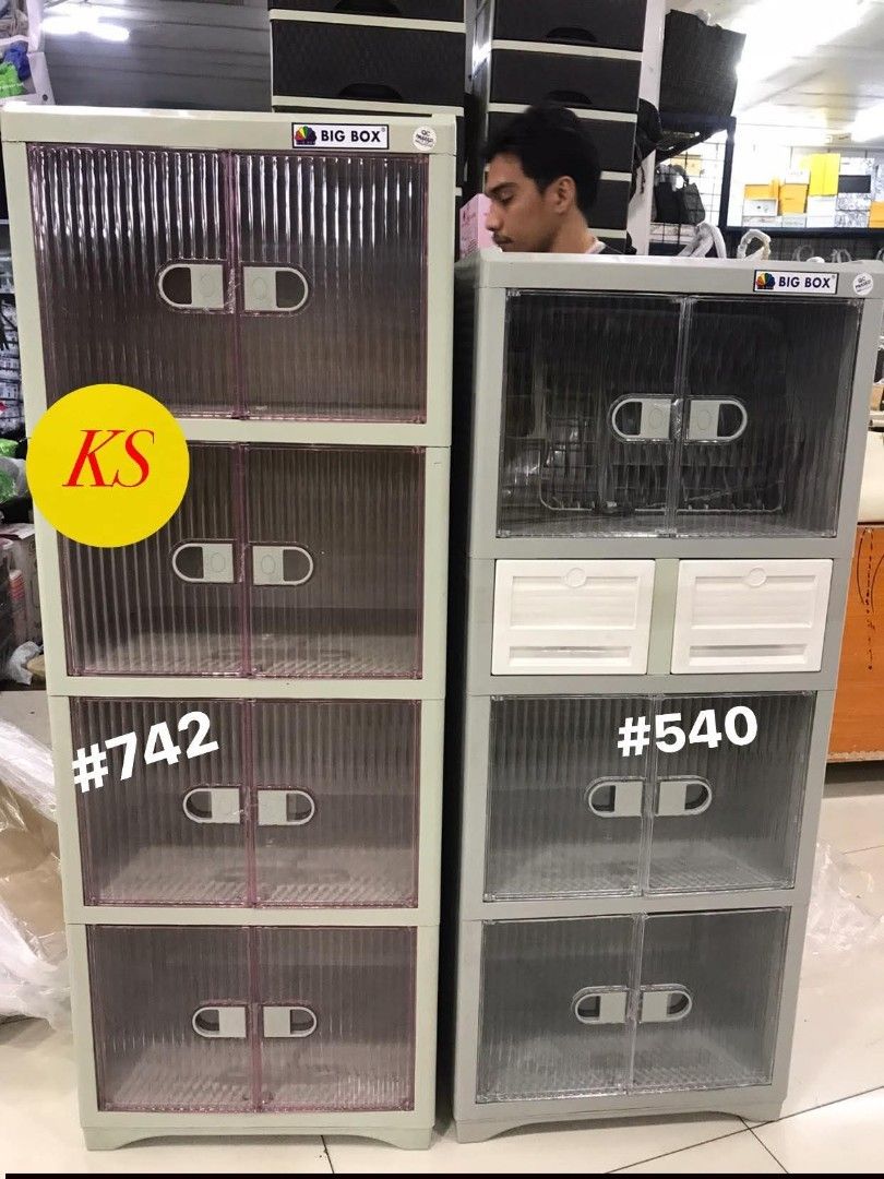 Big Box Storage Cabinet #742 and #540 (Category: Shelves, Cabinets & Racks) located in Taguig. Submitted by diannecaya86853 (Listing ID 1421917542, Image 1). Description: - Durable Big Box storage cabinets - Multiple compartments with transparent doors - Available colors: - Light gray with pinkish doors - Gray with white drawers - Features handles for easy opening - Ideal for home and office organization.