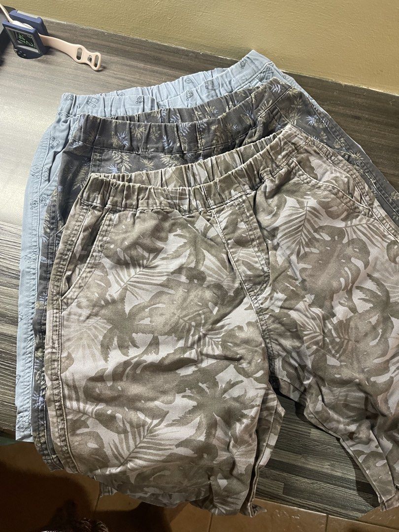 Boys' Shorts - Size 140 unglo (Category: Babies & Kids Fashion) located in Manila. Submitted by eliassssss (Listing ID 1421892686, Image 1). Description: - Boys' shorts - Size: 140 - Design: Tropical leaf pattern (gray and green) - Features: Elastic waistband, pockets - Fabric: Comfortable for everyday wear.
