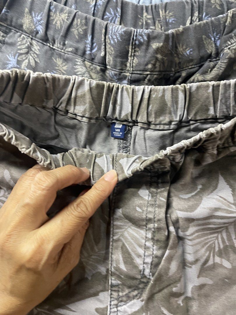 Boys' Shorts - Size 140 unglo (Category: Babies & Kids Fashion) located in Manila. Submitted by eliassssss (Listing ID 1421892686, Image 3). Description: - Boys' shorts - Size: 140 - Design: Tropical leaf pattern (gray and green) - Features: Elastic waistband, pockets - Fabric: Comfortable for everyday wear.