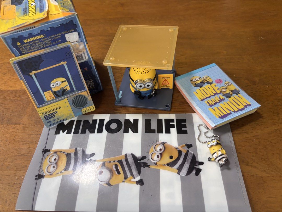 bundle: Minion Popmart & 3 other merch (Category: Character Goods) located in Calamba. Submitted by cur8d (Listing ID 1421883431, Image 1). Description: opened box missing 2 poles includes mini folder, mini pad , mini charm .