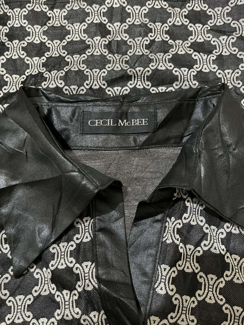 Cecil McBee Y2K Monogram Top w/ Satin Contrast Collar (Category: Shirts) located in Zamboanga. Submitted by archivist_ (Listing ID 1421910478, Image 3). Description: Score a piece of Japanese fashion history with this authentic top from the iconic "Gyaru" label, CECIL McBEE. This piece perfectly blends a luxury monogram aesthetic with an edgy, early 2000s streetwear vibe. Brand: Cecil McBee (Authentic Japanese Label) Design: Bold, all-over interl