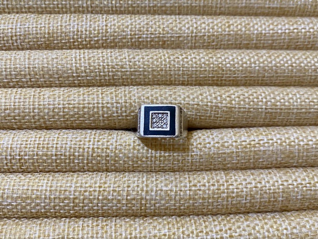 Center Black Stone with white gems Ring |S925 (Category: Rings) located in Solano. Submitted by silvershineph (Listing ID 1421840909, Image 1). Description: ✧ Product / Item Name: Center Black Stone with white gems Ring ✧ Description: A masculine, square-faced signet ring with a recessed black center. ✧ Size: 7 ✧ Weight: 6.8g ✧ Details: • Genuine silver • Carefully inspected quality • Ready for shipment For inquiries or reservations, feel free to