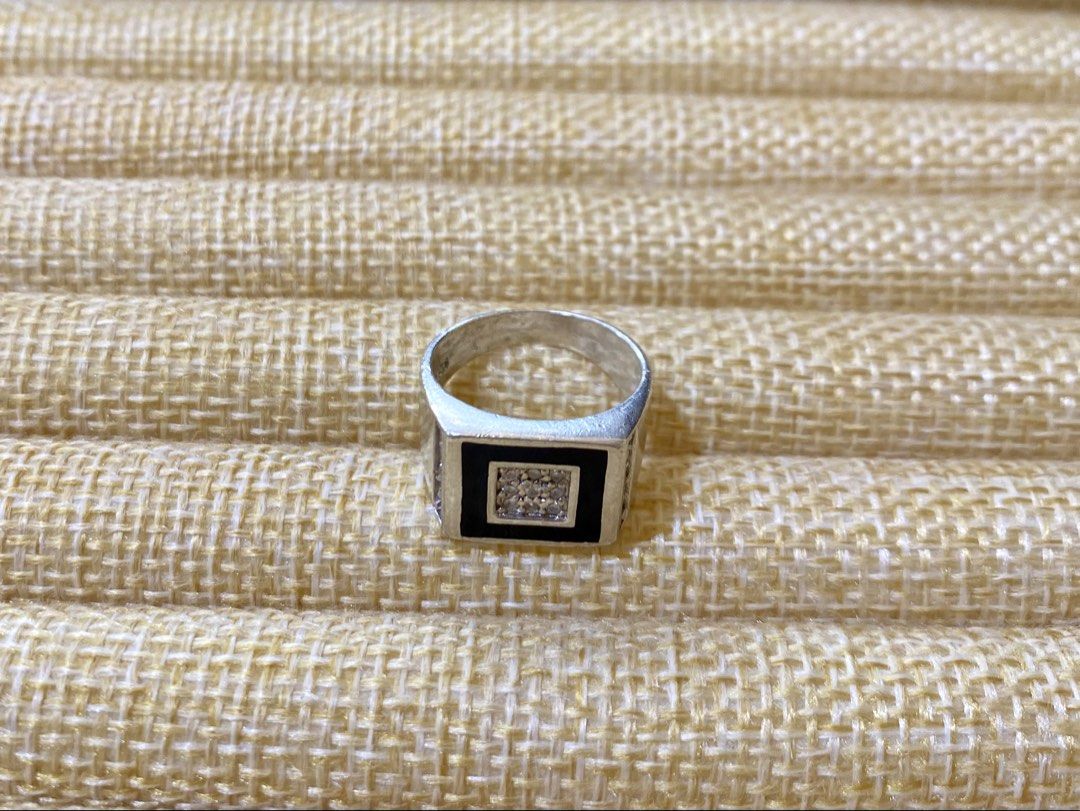 Center Black Stone with white gems Ring |S925 (Category: Rings) located in Solano. Submitted by silvershineph (Listing ID 1421840909, Image 2). Description: ✧ Product / Item Name: Center Black Stone with white gems Ring ✧ Description: A masculine, square-faced signet ring with a recessed black center. ✧ Size: 7 ✧ Weight: 6.8g ✧ Details: • Genuine silver • Carefully inspected quality • Ready for shipment For inquiries or reservations, feel free to