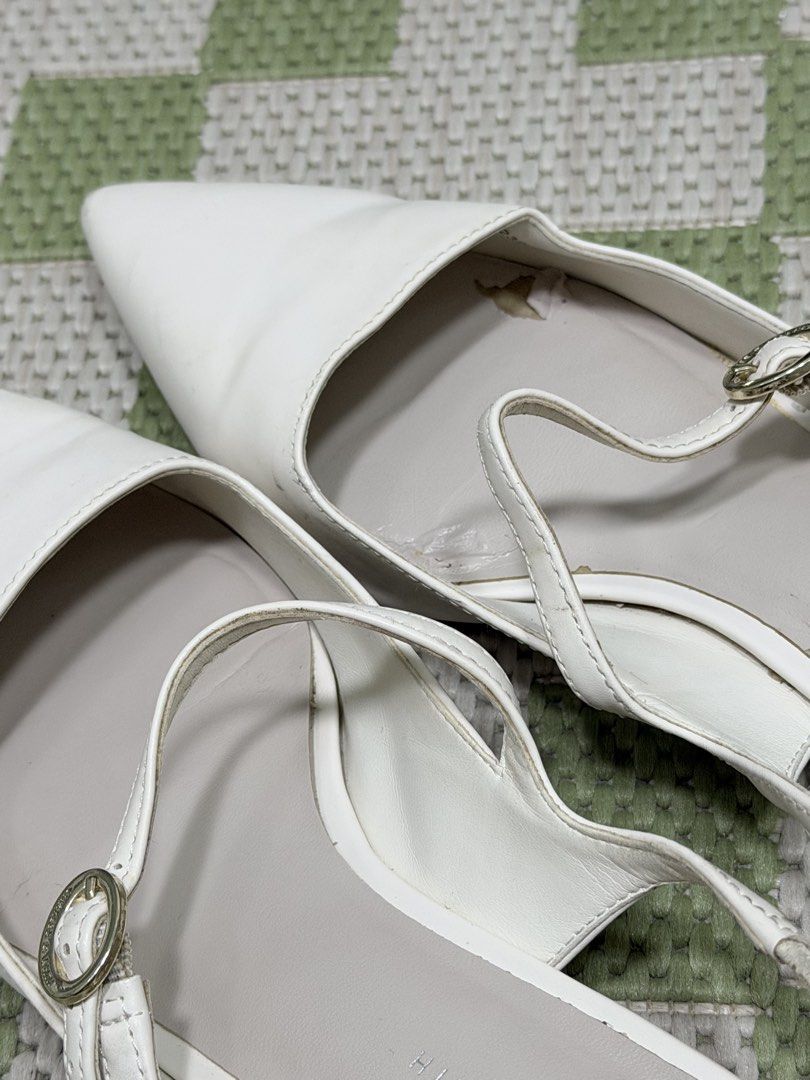 Charles & Keith White Sandals (Category: Flats & Sandals) located in Taguig. Submitted by issa23fourfive (Listing ID 1421872607, Image 3). Description: Issues: minor flaws on the soles that can be restored or cleaned from shoe cleaning shops..