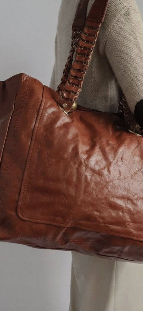 Chloe Big Brown Leather Tote Bag (Category: Luxury Bags & Wallets) located in Quezon City. Submitted by cncarousel (Listing ID 1421845955, Image 2). Description: - Authentic Chloe tote bag - Brown leather - Braided handles - Gold-tone hardware - Spacious interior - Zipper closure - Chloe logo inside - Made in Italy - Perfect for everyday use.