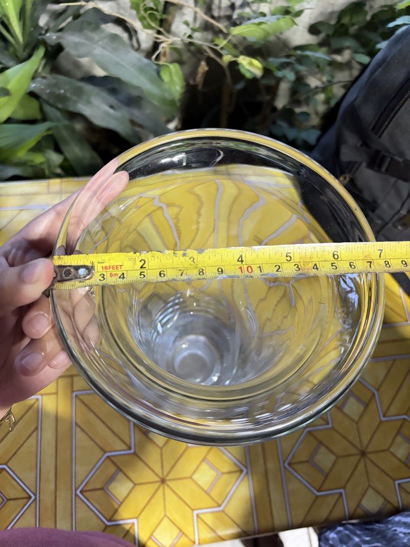 Clear Glass Vase (Category: Vases & Decorative Bowls) located in Dasmarinas. Submitted by andrae03 (Listing ID 1421877020, Image 3). Description: Elegant glass vase. Features a flared top and frosted base. — 18inches tall, 7 inches diameter. Perfect for flowers or decor. — have dents, as you can see sa pic.