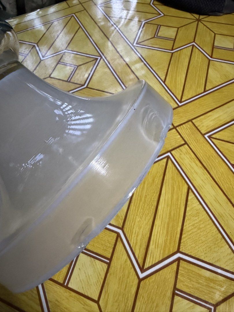 Clear Glass Vase (Category: Vases & Decorative Bowls) located in Dasmarinas. Submitted by andrae03 (Listing ID 1421877020, Image 2). Description: Elegant glass vase. Features a flared top and frosted base. — 18inches tall, 7 inches diameter. Perfect for flowers or decor. — have dents, as you can see sa pic.