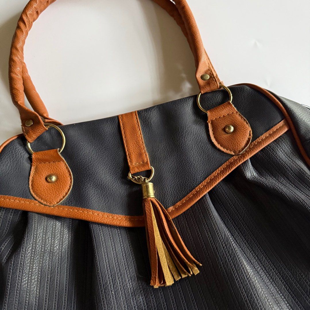 Dark Blue Fringe Detail Bag (Category: Shoulder Bags) located in Iloilo. Submitted by notriaaa (Listing ID 1421799778, Image 2). Description: Size: Medium -LxWxH: 15”x5.5”x10” Signs of use in gold hardware but not noticeable.