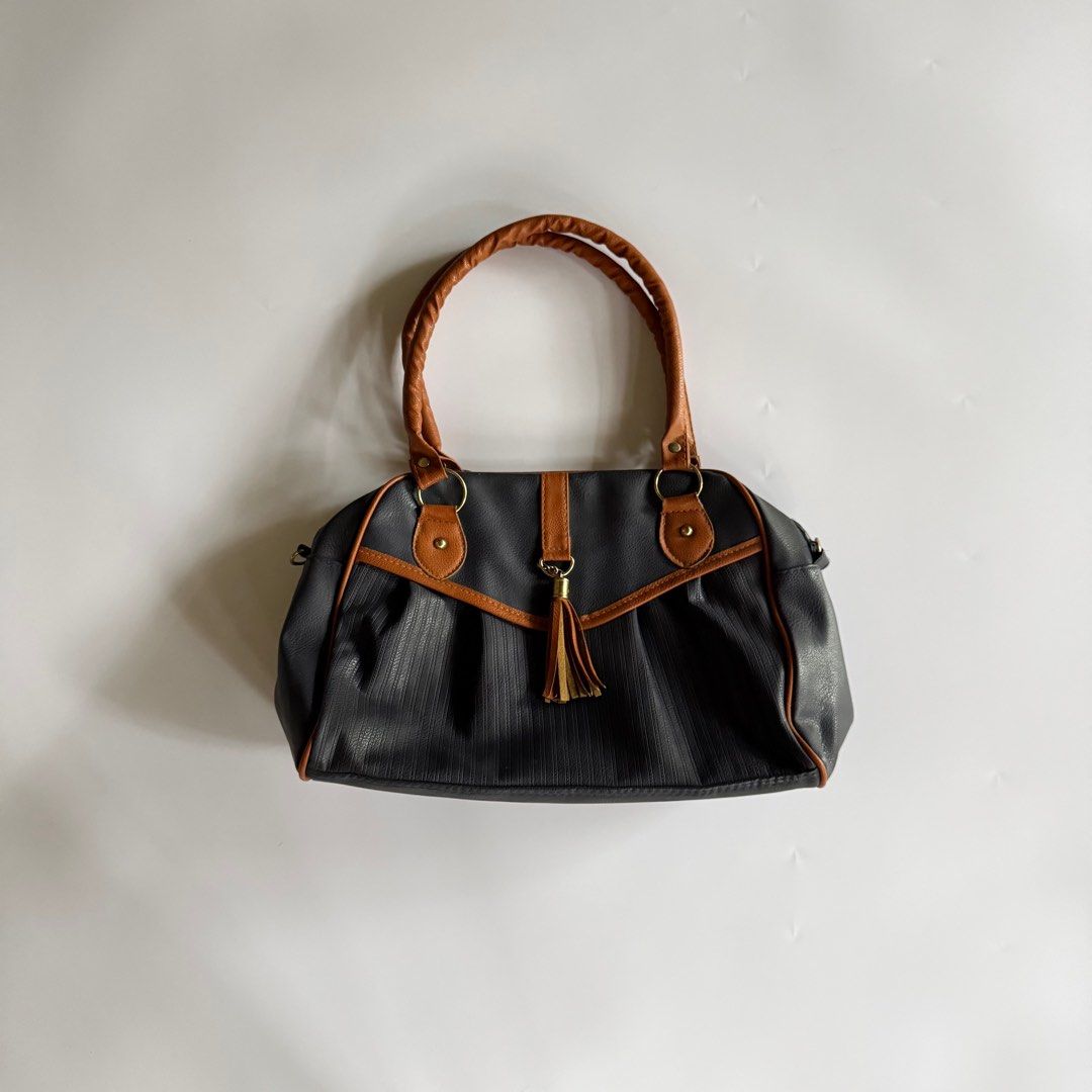 Dark Blue Fringe Detail Bag (Category: Shoulder Bags) located in Iloilo. Submitted by notriaaa (Listing ID 1421799778, Image 1). Description: Size: Medium -LxWxH: 15”x5.5”x10” Signs of use in gold hardware but not noticeable.