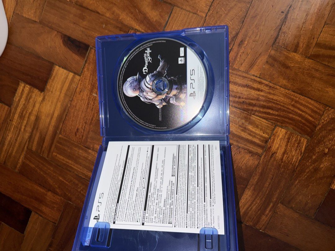 Demon's Souls PS5 Game (Category: PlayStation) located in Manila. Submitted by slushi.shark (Listing ID 1421885754, Image 2). Description: - Demon's Souls for PlayStation 5 - Includes game disc and original case - Case color: Blue - Condition: Good - Published by: Bluepoint Games and PlayStation Studios.