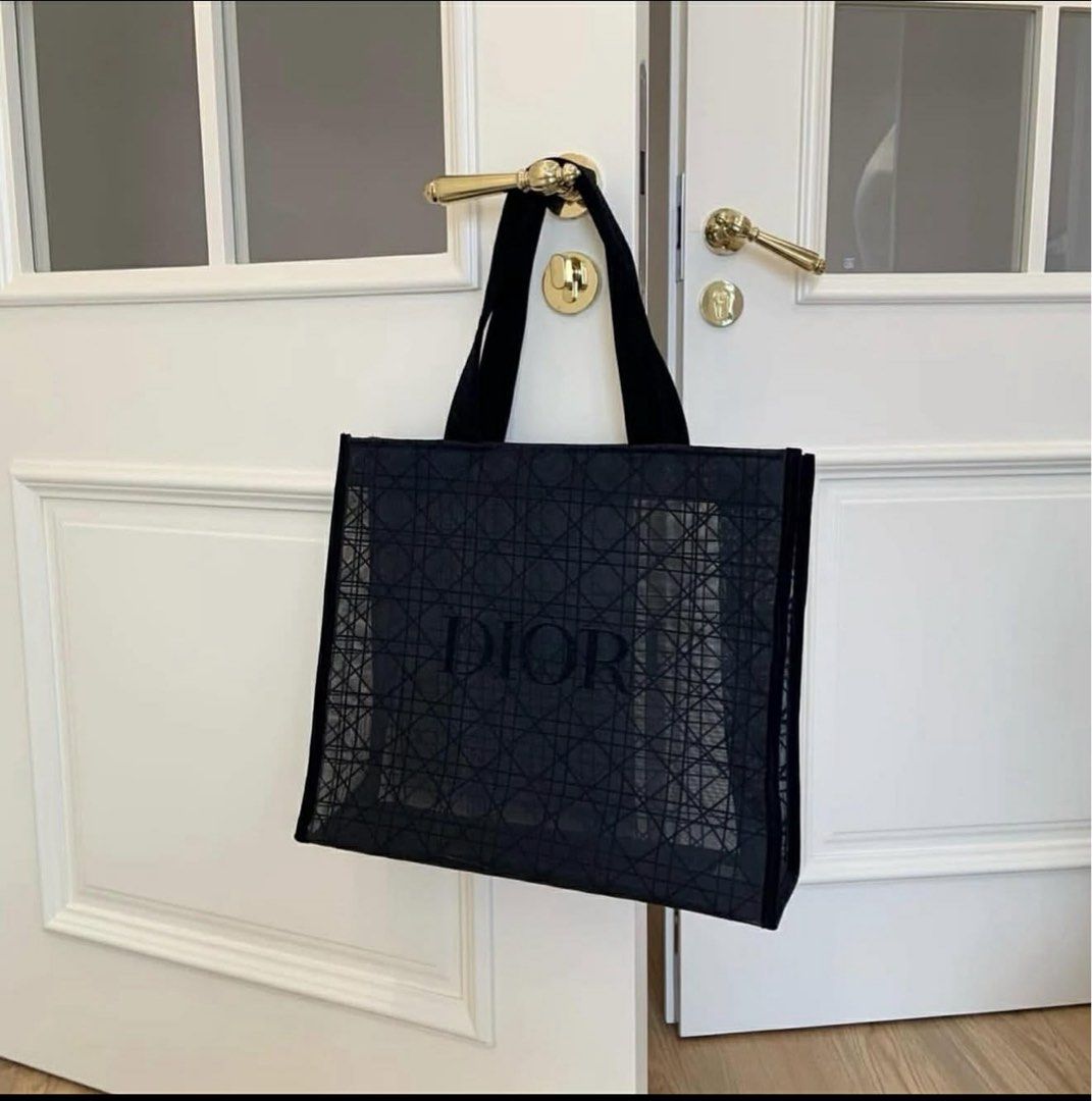 Dior Tote Bag (Category: Luxury Bags & Wallets) located in Quezon City. Submitted by cutiedzshane (Listing ID 1421809336, Image 2). Description: - Authentic Dior Tote Bag (Complimentary Gift) - Black design with Dior logo - Woven pattern - Black handles - Dimensions: 410mm x 380mm x 150mm .
