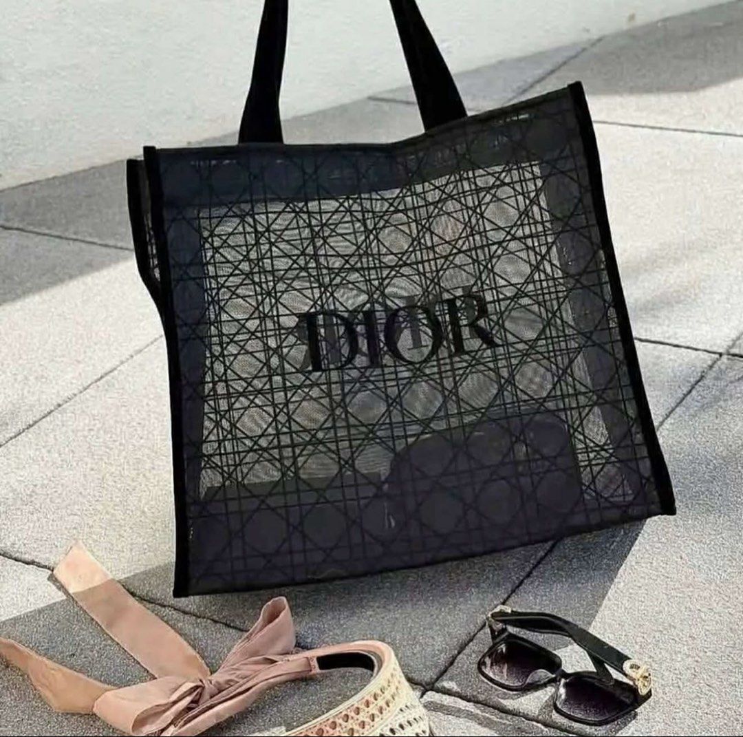 Dior Tote Bag (Category: Luxury Bags & Wallets) located in Quezon City. Submitted by cutiedzshane (Listing ID 1421809336, Image 1). Description: - Authentic Dior Tote Bag (Complimentary Gift) - Black design with Dior logo - Woven pattern - Black handles - Dimensions: 410mm x 380mm x 150mm .