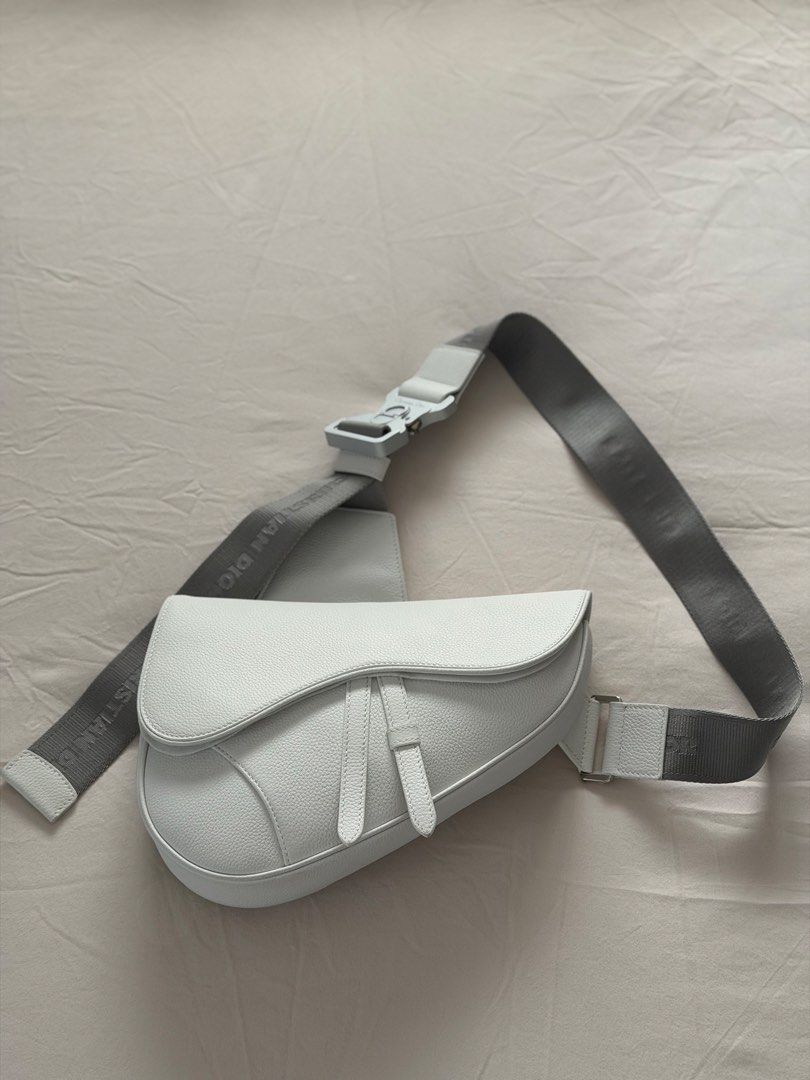 Dior Saddle Bag (rare white) (Category: Luxury Bags & Wallets) located in Taguig. Submitted by ericalopez (Listing ID 1421887608, Image 1). Description: Dior Saddle Bag (rare white) Price: 120,000 —> 89,000 Unused with box, dust bag, care card 100% Authentic Location: Pick up Or Delivery via lalamove or lbc .