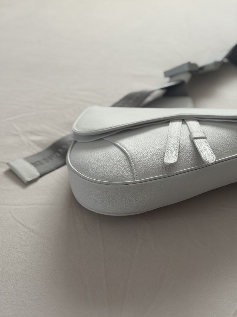 Dior Saddle Bag (rare white) (Category: Luxury Bags & Wallets) located in Taguig. Submitted by ericalopez (Listing ID 1421887608, Image 2). Description: Dior Saddle Bag (rare white) Price: 120,000 —> 89,000 Unused with box, dust bag, care card 100% Authentic Location: Pick up Or Delivery via lalamove or lbc .